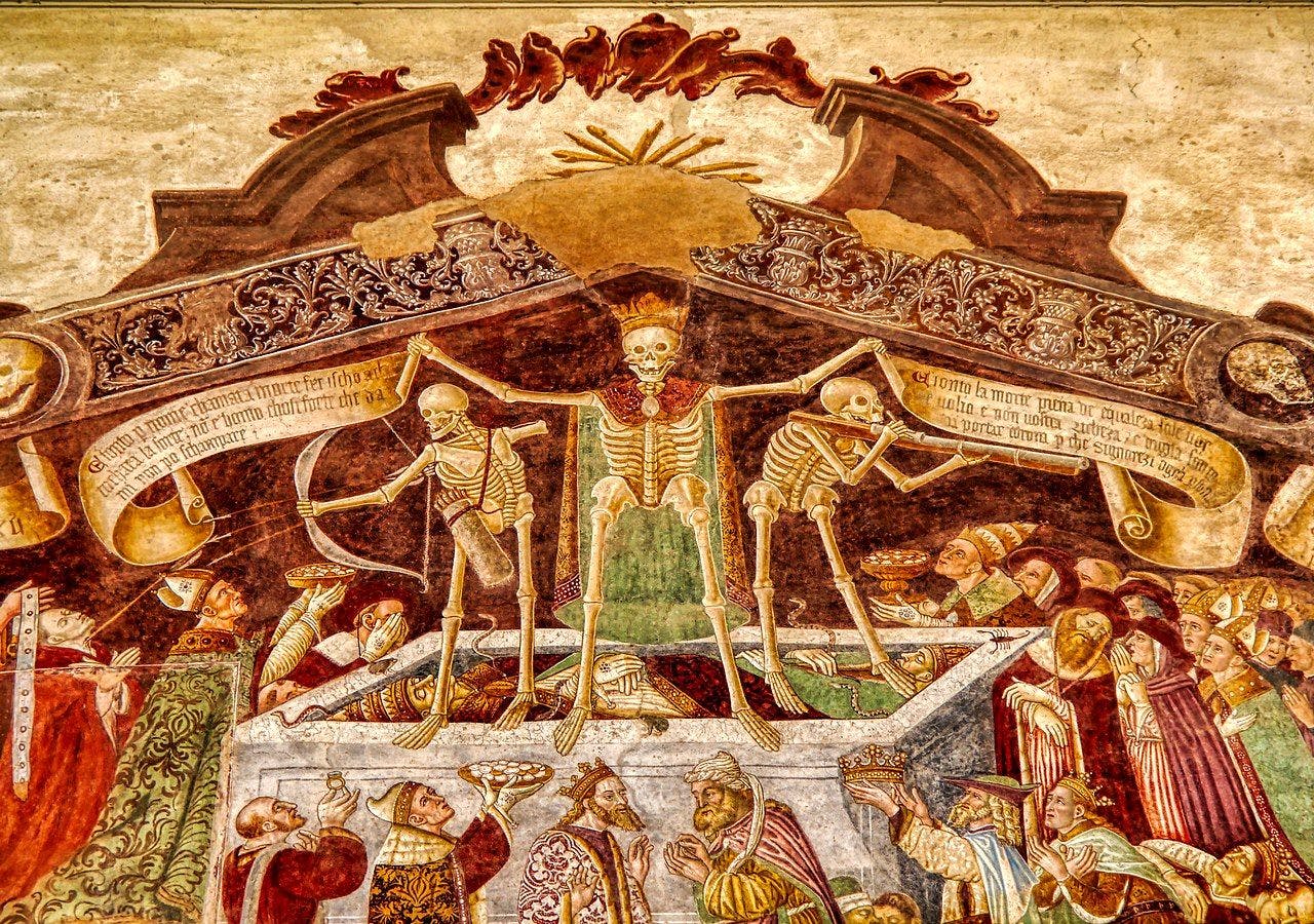 <p>&#8220;Macabre Dance&#8221; fresco (by Paolo da Reggio CC BY-SA 3.0 via Wikimedia Commons)</p>
