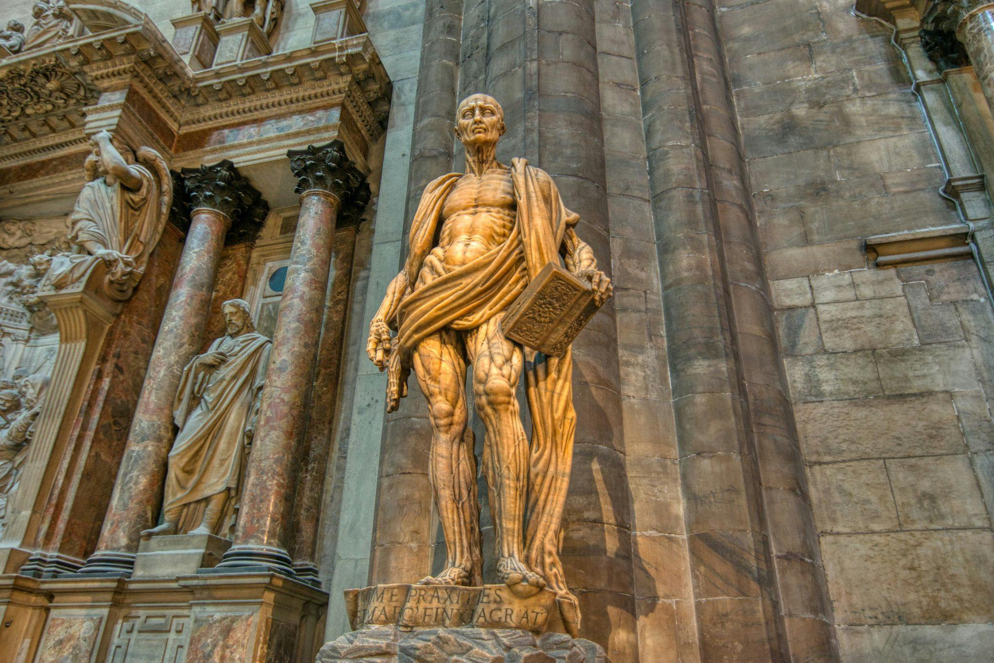 View of the statue of Marco D'Agrate inside the Duomo of Milan (by Jorge Làscar, CC BY 2.0 via Flickr)